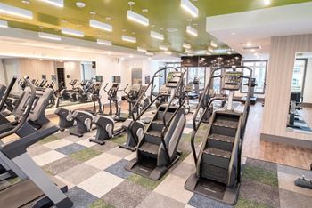 2-Story, tech advanced fitness center with cardio and strength training equipment
